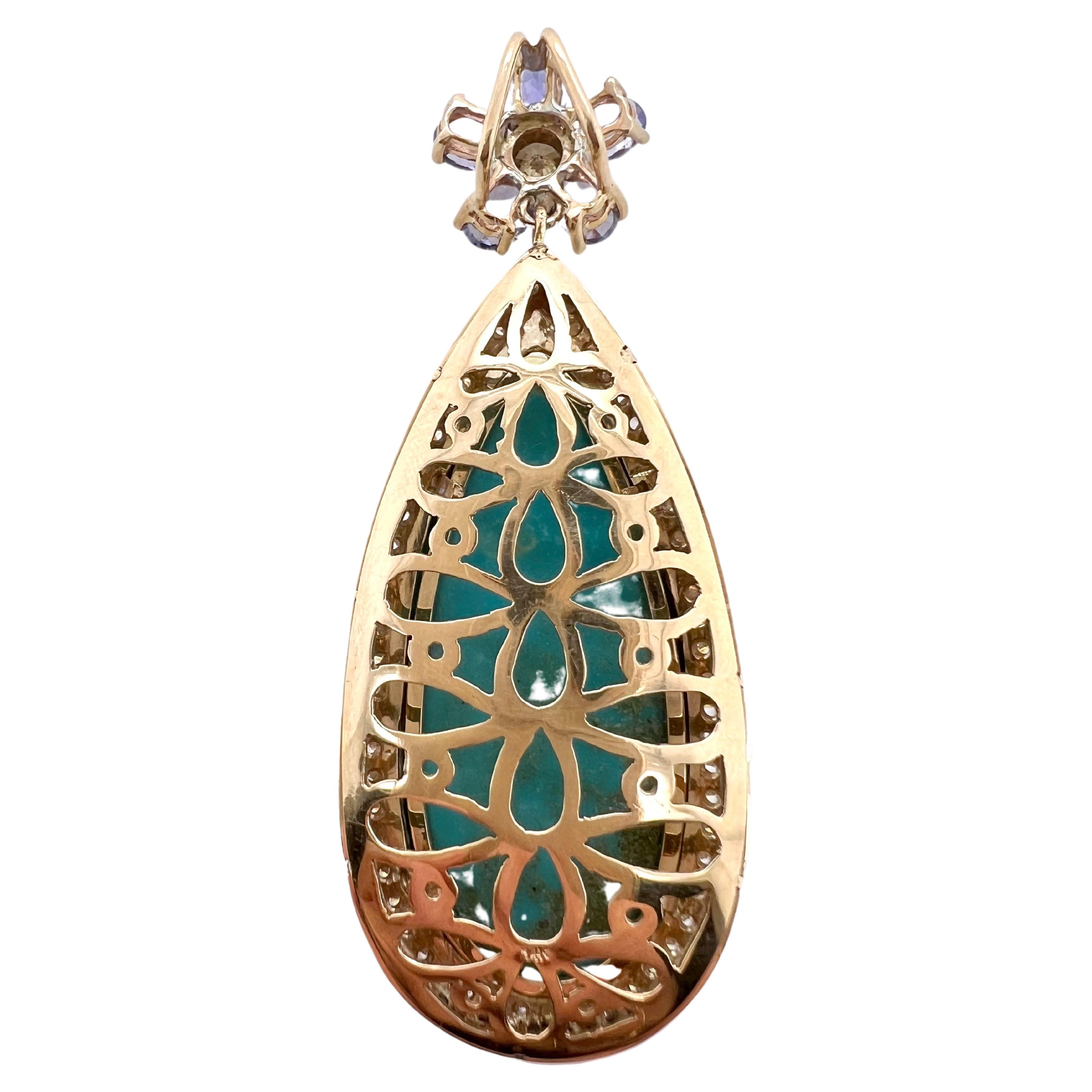 Pear Cut Sleeping Beauty Turquoise Pendant with Tanzanite, Diamonds and Sapphire For Sale