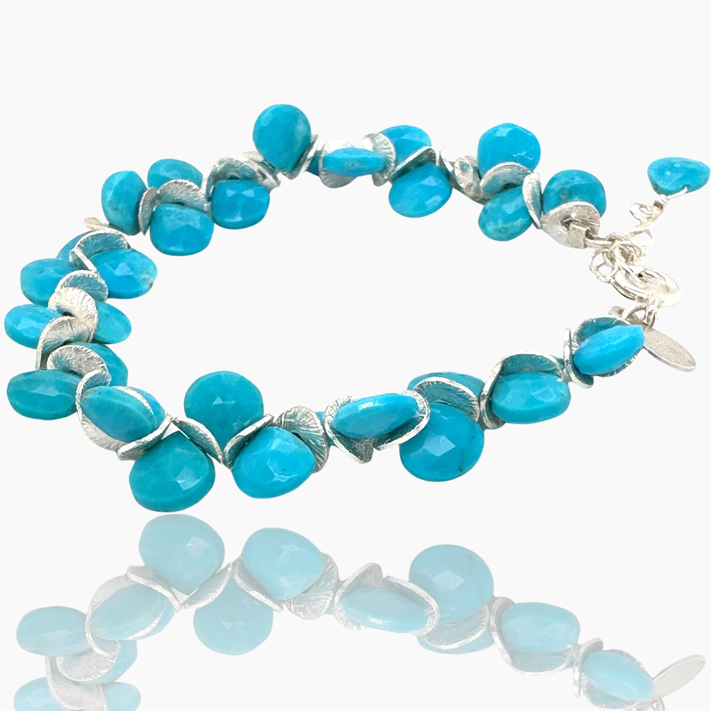 This limited edition bracelet features Sleeping Beauty Turquoise gems detailed with sterling silver discs and a sterling spring ring clasp. It is crafted using stones from the now-closed Sleeping Beauty mine in Arizona.

Available in Small (6-7