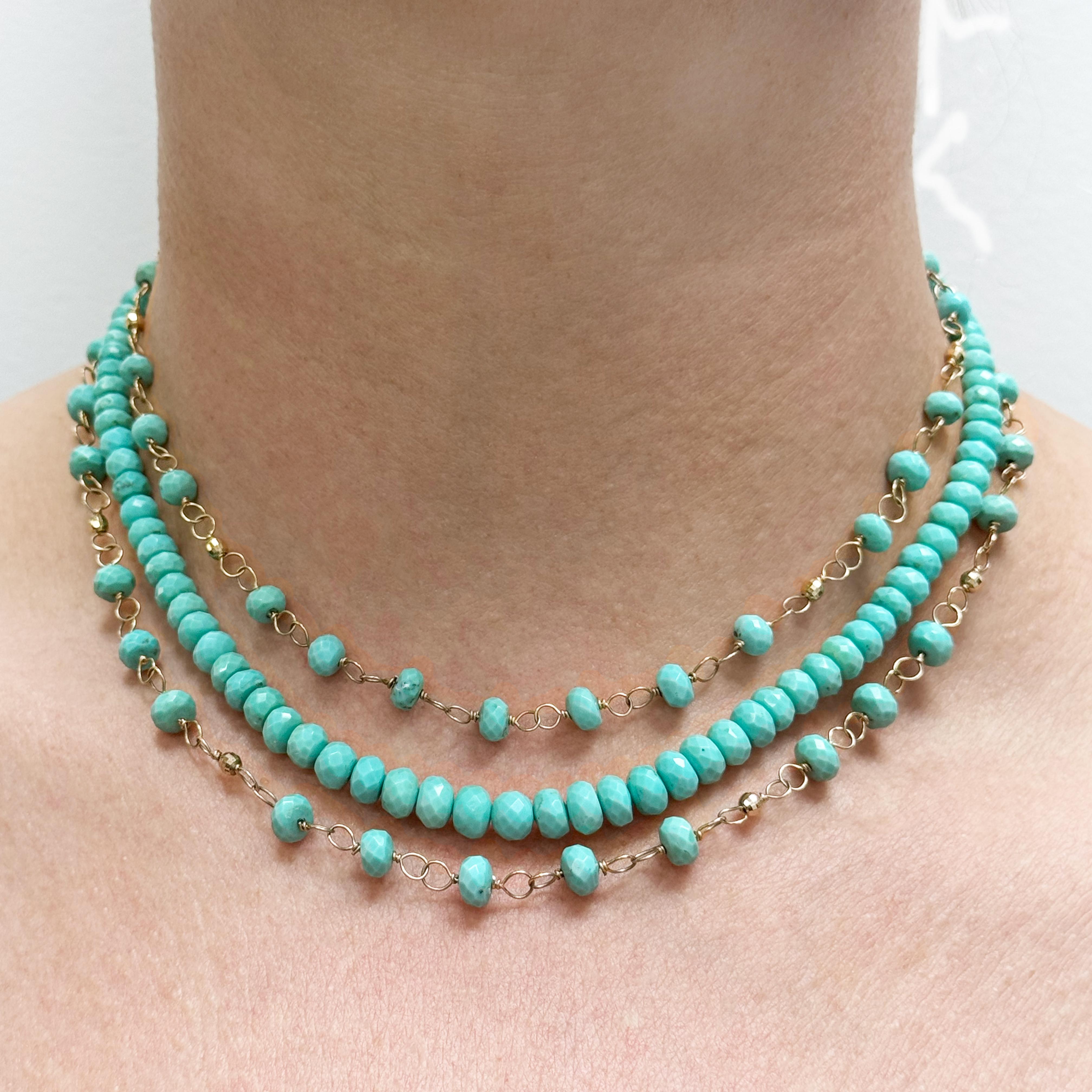 Description
This vibrant and joyful three strand Sleeping Beauty Turquoise necklace doesn’t go unnoticed. The mix of hand wire-wrapped and classically strung Turquoise strands, combined with scattered 14k gold faceted balls, makes a feminine and