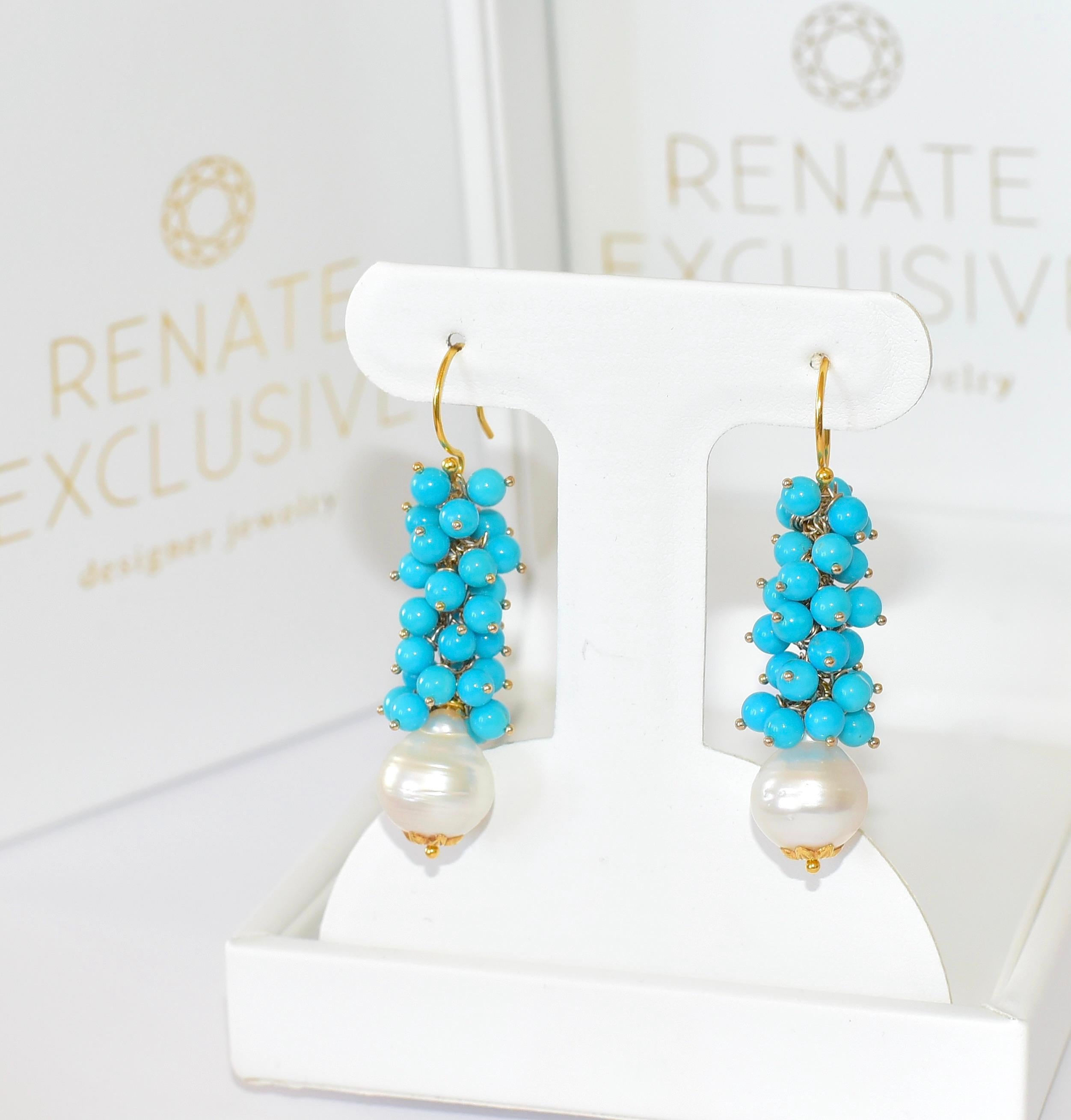 Beautiful turquoise (beads size 4.3mm) wonderfully moving earrings, Renate Exclusive must-have style!
White South Sea Baroque Pearl size is 13.5 mm. 
The total length of the earrings is 1.7 inches
18K Solid Yellow Gold Thick (strong) Earwire with
