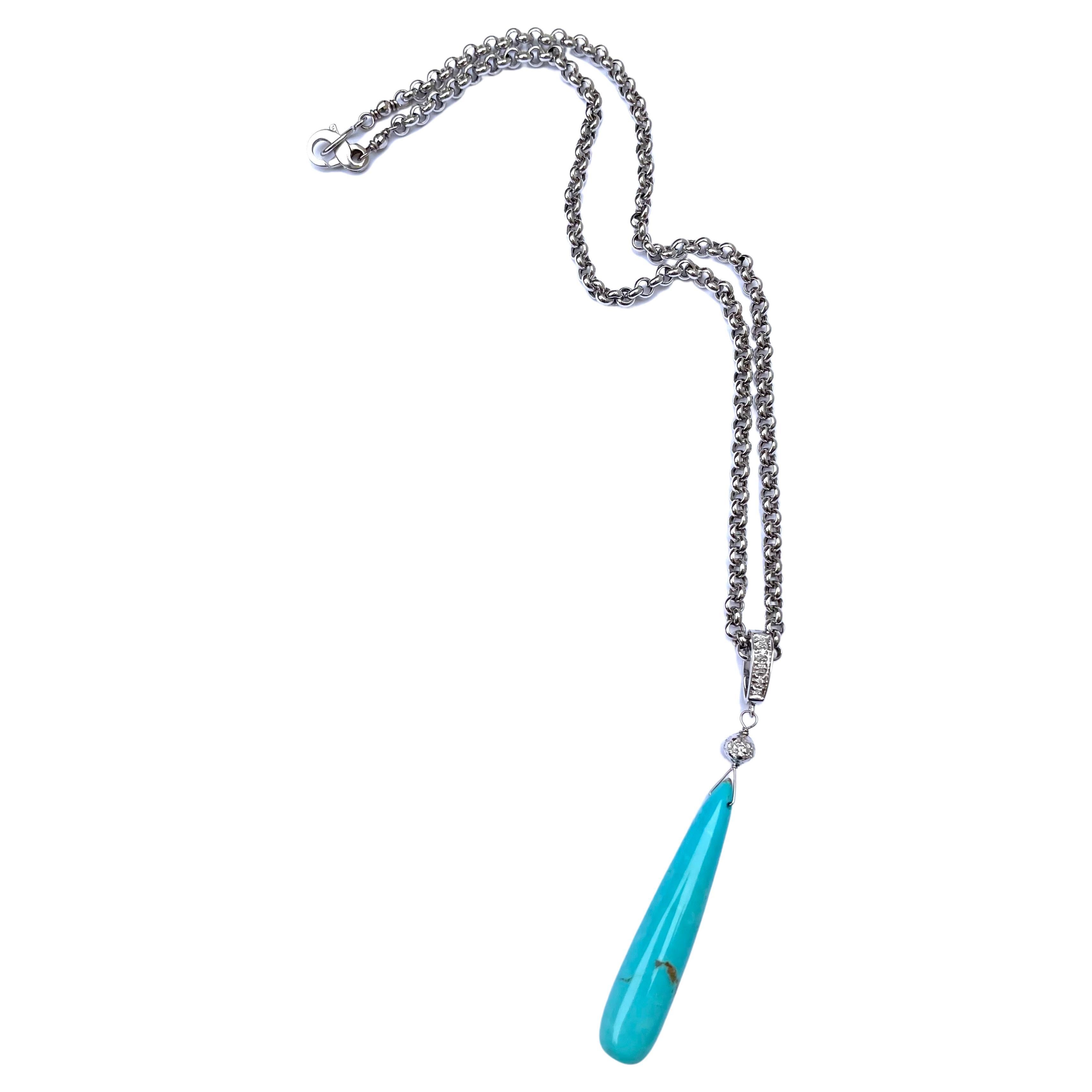 Description
Exquisite, long and smooth Sleeping Beauty turquoise briolette drop with its natural matrix, diamond accented on a 14k white gold chain. Pendant is removable, but not sold separately.
Item # N3846

Materials and Weight
Sleeping Beauty