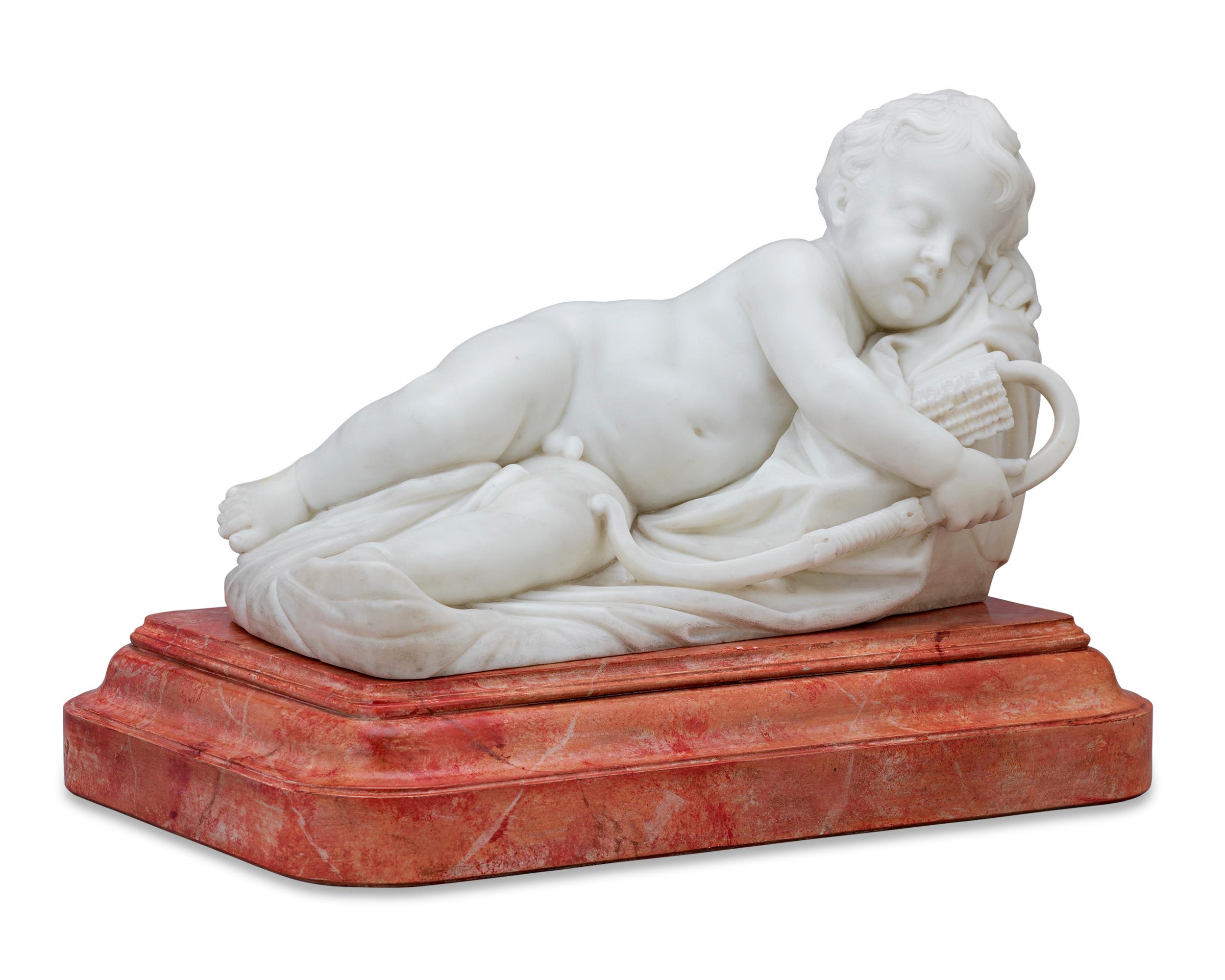 The theme of the cherubic Cupid sleeping has prevailed throughout art history, emerging as a popular subject in Greco-Roman art and persisting through the 19th century, and this Italian marble work crafted in the manner of celebrated artisan