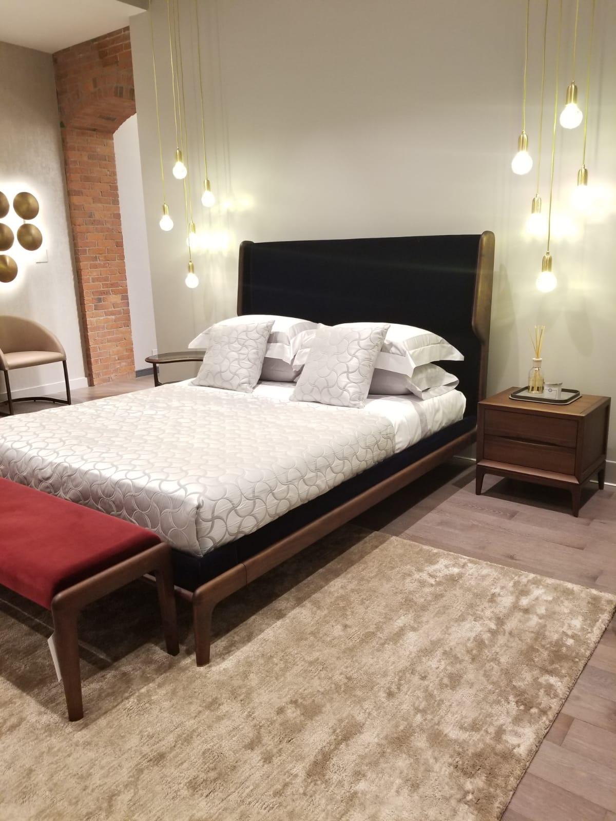 This product is currently on showroom display. 

Ceccotti Collezioni sleeping muse designed by Roberto Lazzeroni 
Queen size bed made in dark solid American walnut, bed base in veneered plywood, upholstered headboard and bed fascia, covered in navy