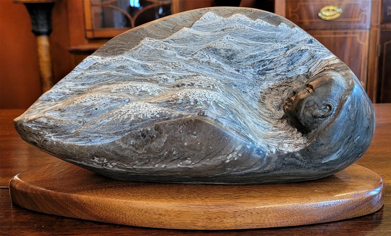 Presenting a gorgeous piece of native American art, namely, “Sleepy Mountains” Sculpture by RD Tsosie, made from polished agate.

By the renowned Navajo Contemporary artist, Robert Dale Tsosie.

It is an Agate carving of a male figure sleeping at