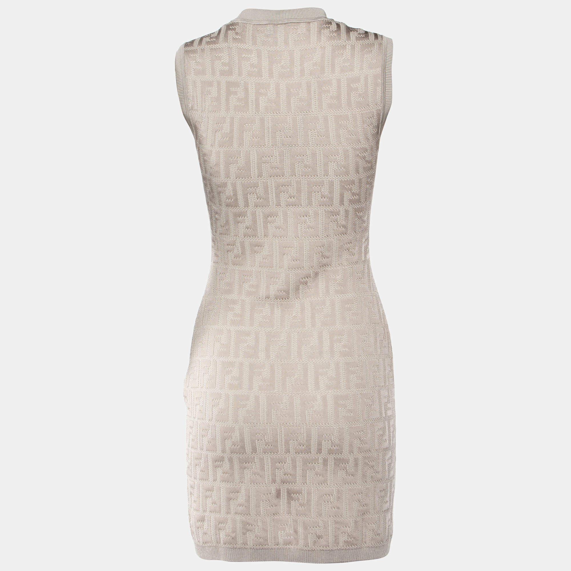 Effortlessly made into a chic design, this Fendi dress is easy to wear and easy to accessorize. Tailored beautifully, the dress is sure to remain a favorite season after season.

Includes: Price Tag