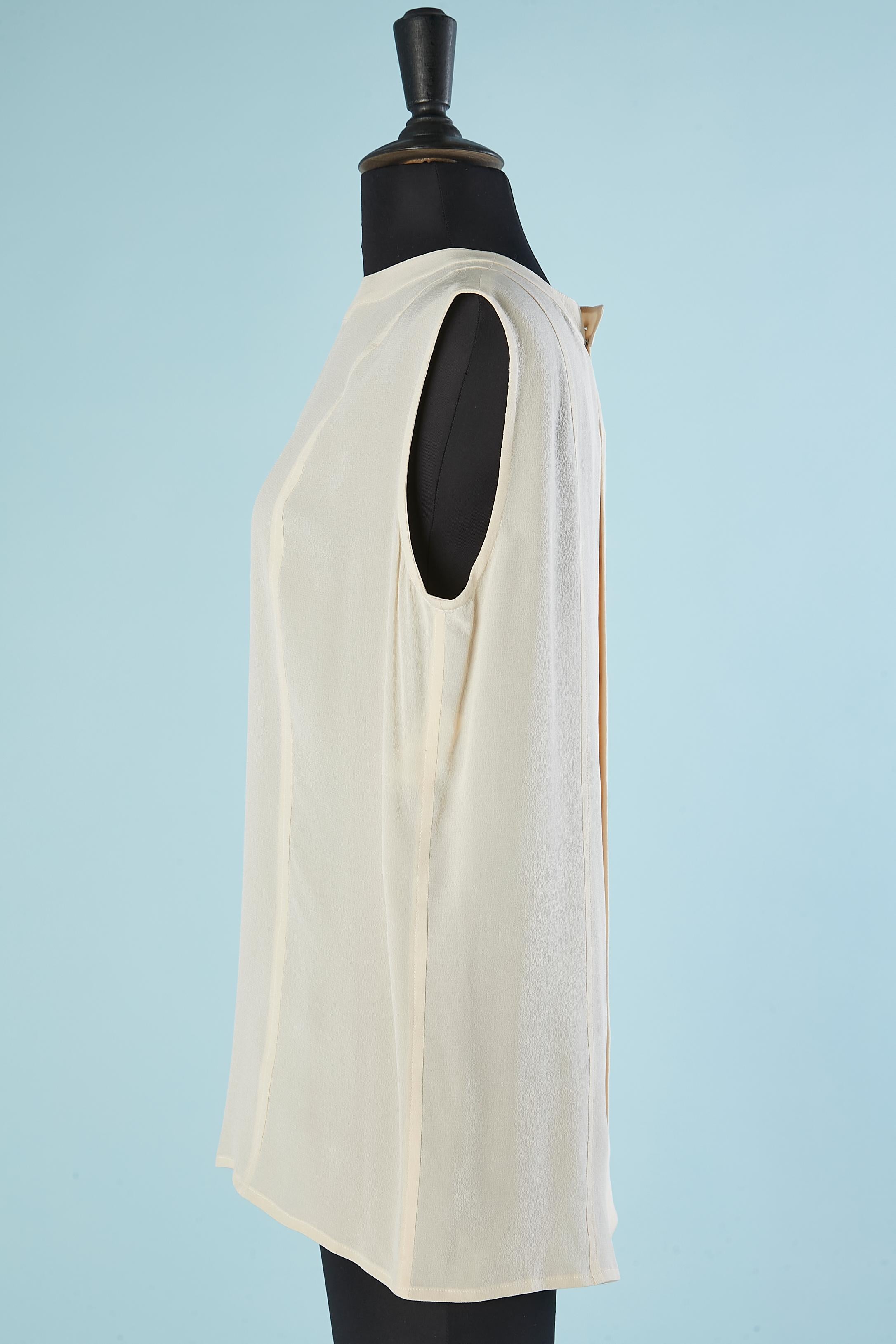 Gray Sleeveless ivory top with buttons in the middle back Chanel Boutique For Sale