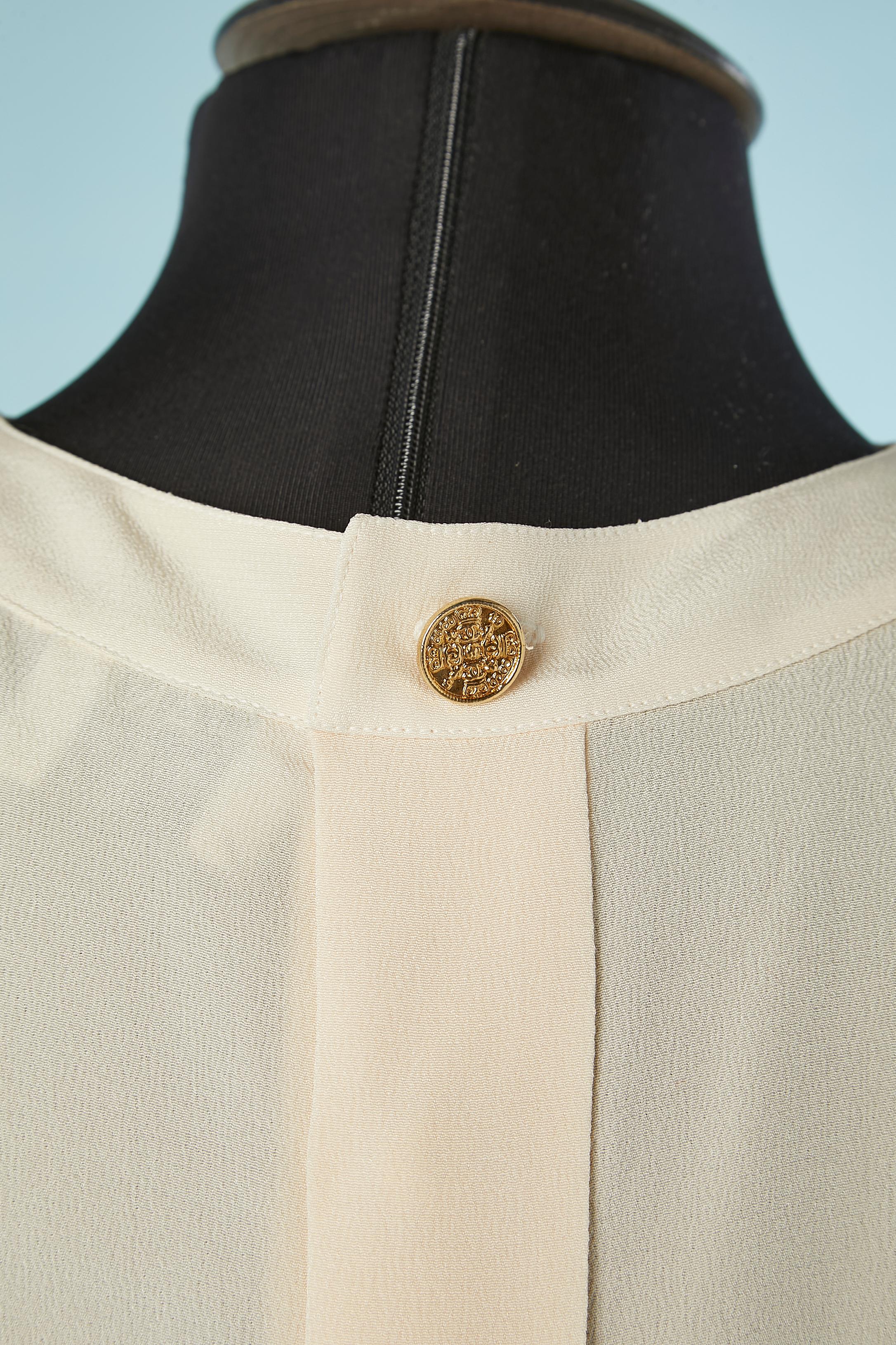 Women's Sleeveless ivory top with buttons in the middle back Chanel Boutique  For Sale