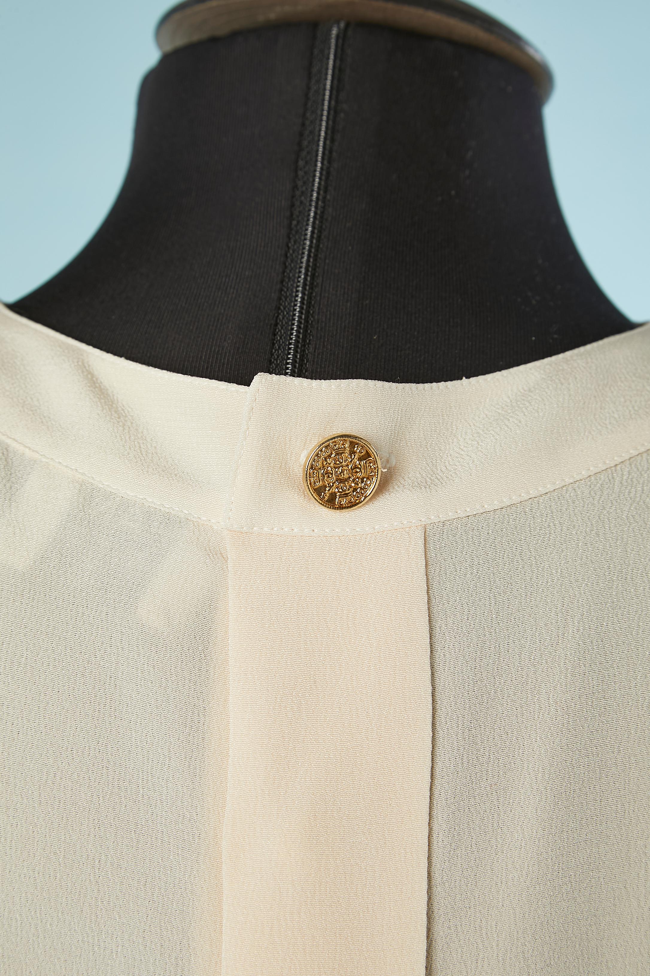 Women's Sleeveless ivory top with buttons in the middle back Chanel Boutique For Sale