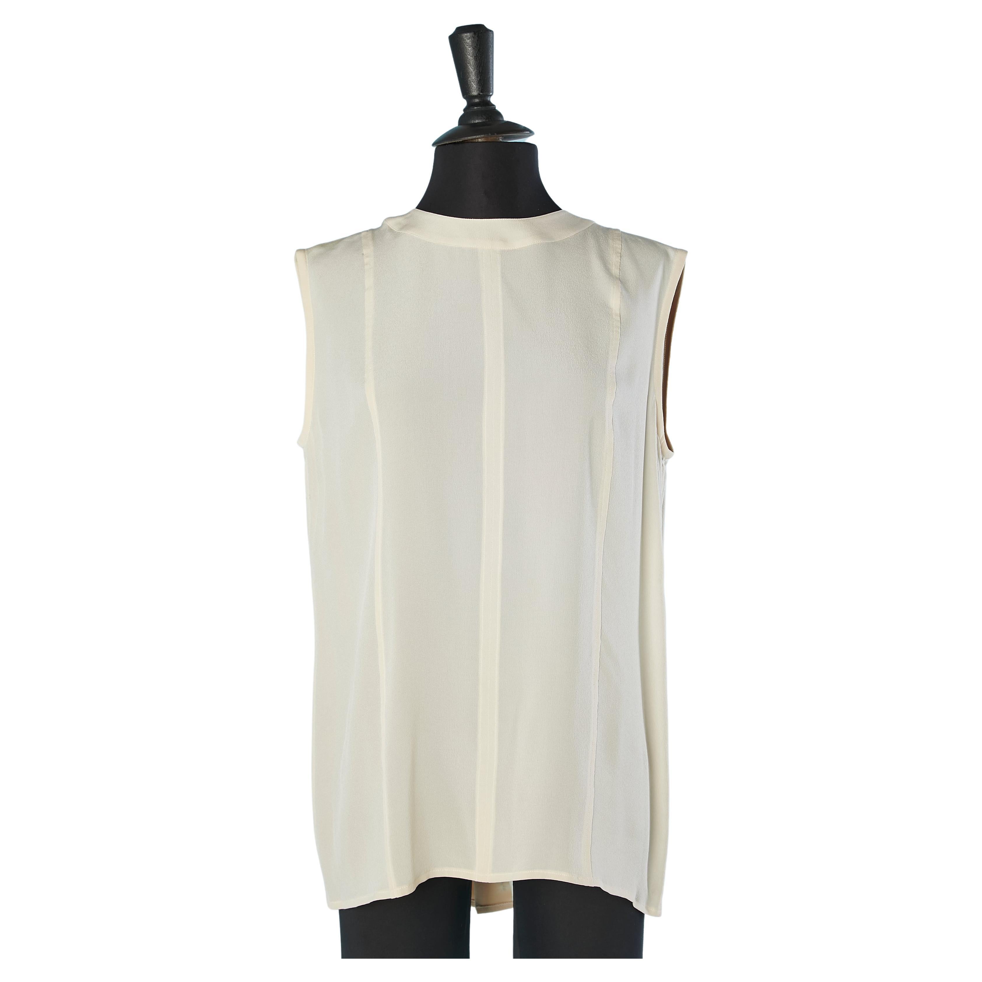 Sleeveless ivory top with buttons in the middle back Chanel Boutique  For Sale