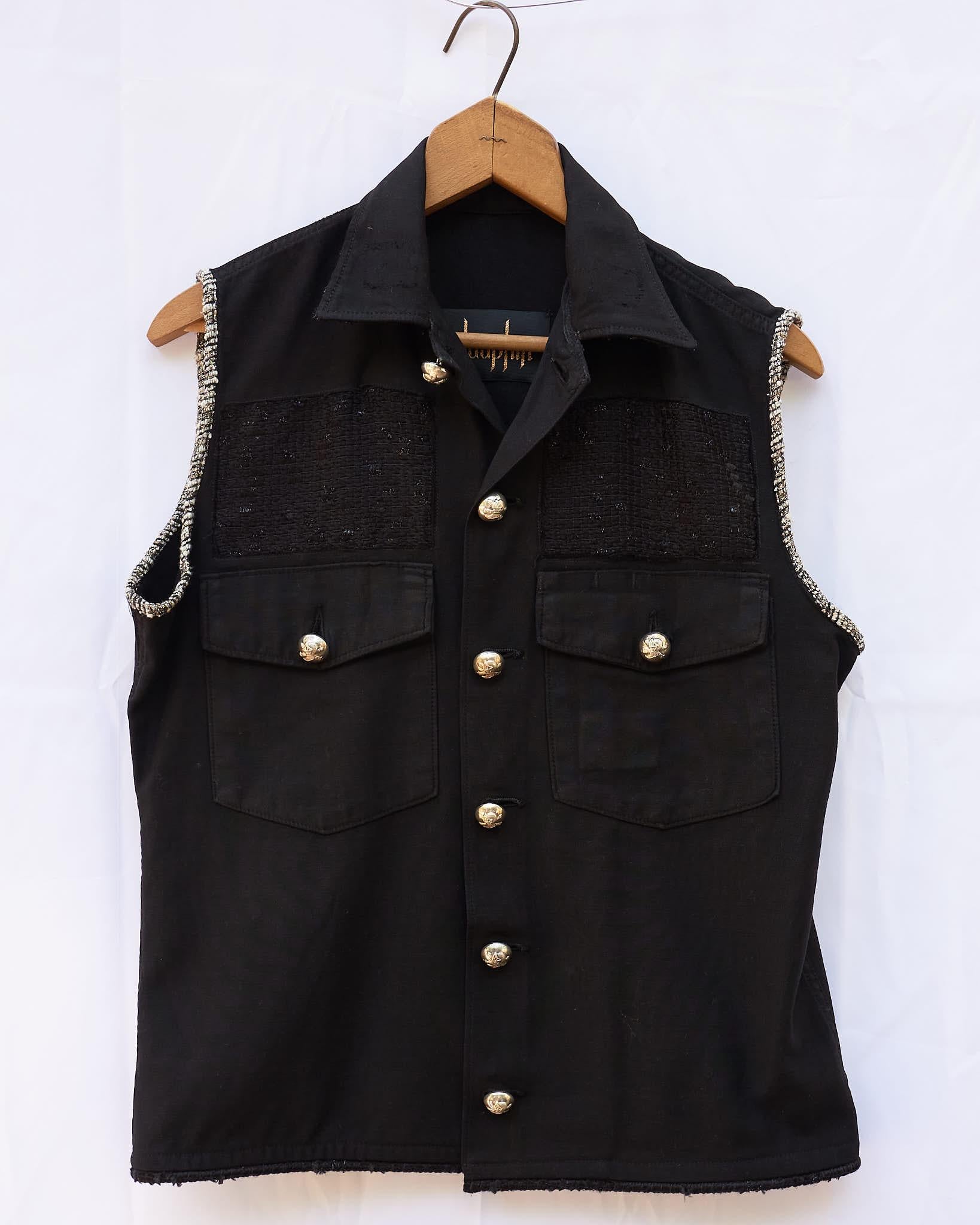 Embellished Black Sleeveless Vintage Military Jacket Repurposed into a Vest with Lurex Tweed In Black and Gold Lurex Bindings,  Vintage Collectible Military Vintage Silver tone Buttons in Brass.

This is a One of a kind Jacket, Fully Sustainable