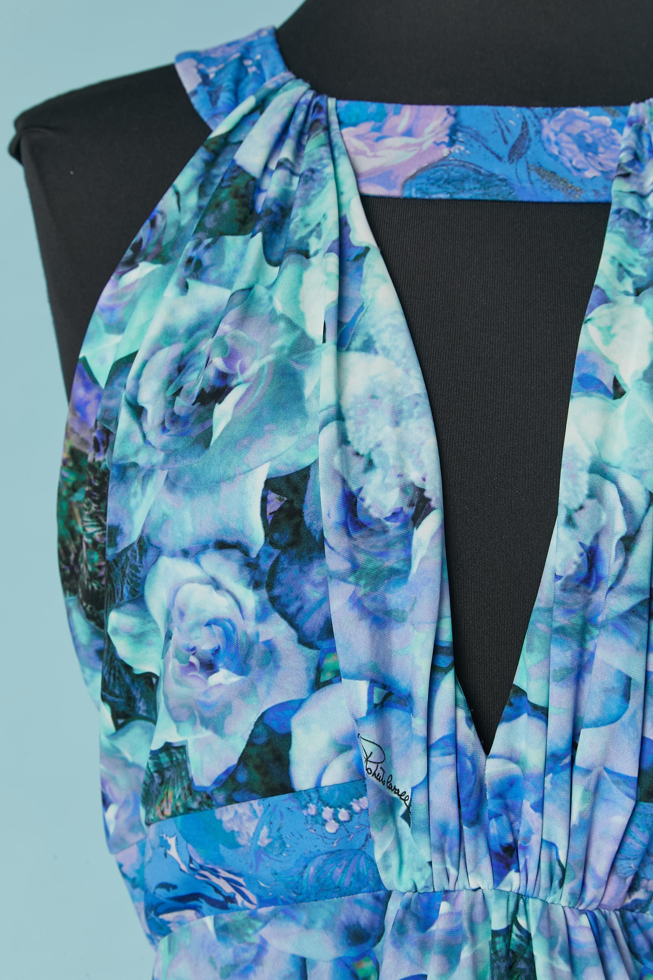 Sleeveless jersey evening dress with blue flower print on. Fabric composition: 88% nylon, 12% elastane. Branded fabric. Draped on the bust. 
Authenticity hologram ( see picture) 
SIZE M 