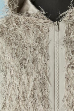 Sleeveless quilted vest with hood and hairly threads Brunello Cucinelli