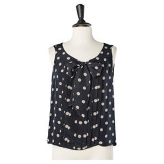 Sleeveless silk polka-dots top with bow and buttons in the back Chanel Boutique 