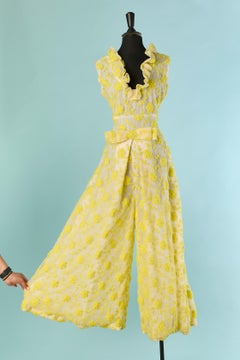 Sleeveless tulle jumpsuit with yellow wool thread embroideries Circa 1960's
