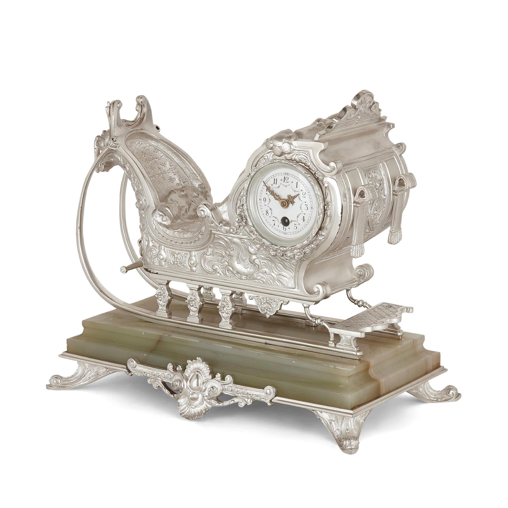 Sleigh-form silvered bronze and green onyx mantel clock
French, late 19th century
Measures: Height 27cm, width 32cm, depth 29cm

This beautiful and unusual clock is formed as a silvered bronze sleigh, which is set upon a rectangular block of