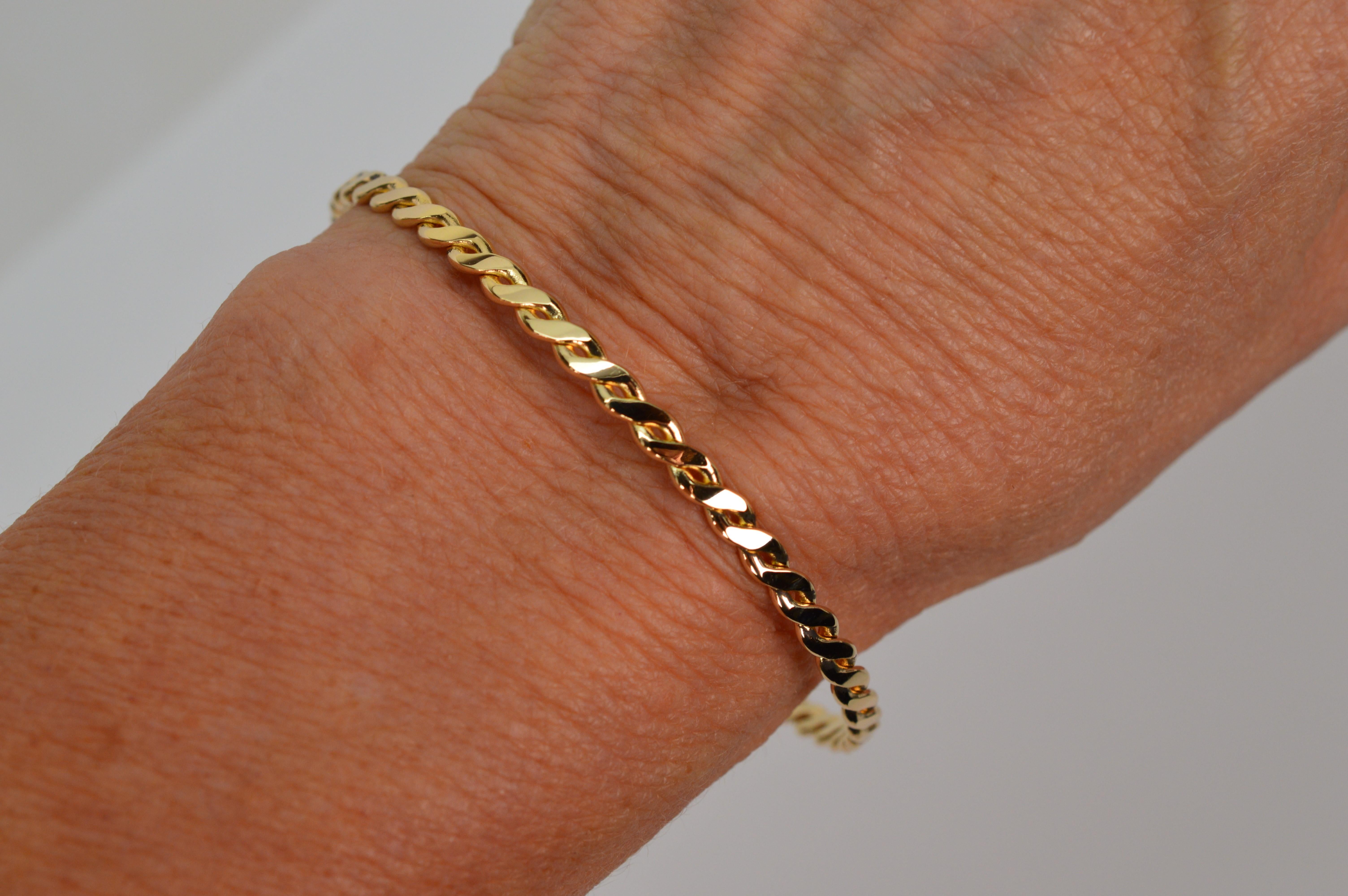 Slender 14 Karat Yellow Gold Twist Bangle Bracelet In New Condition For Sale In Mount Kisco, NY