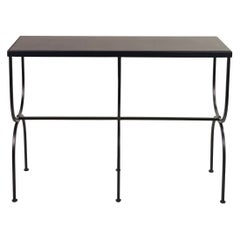 Esbelta consola "Arcade" de hierro forjado y piedra caliza negra de Design Frères
