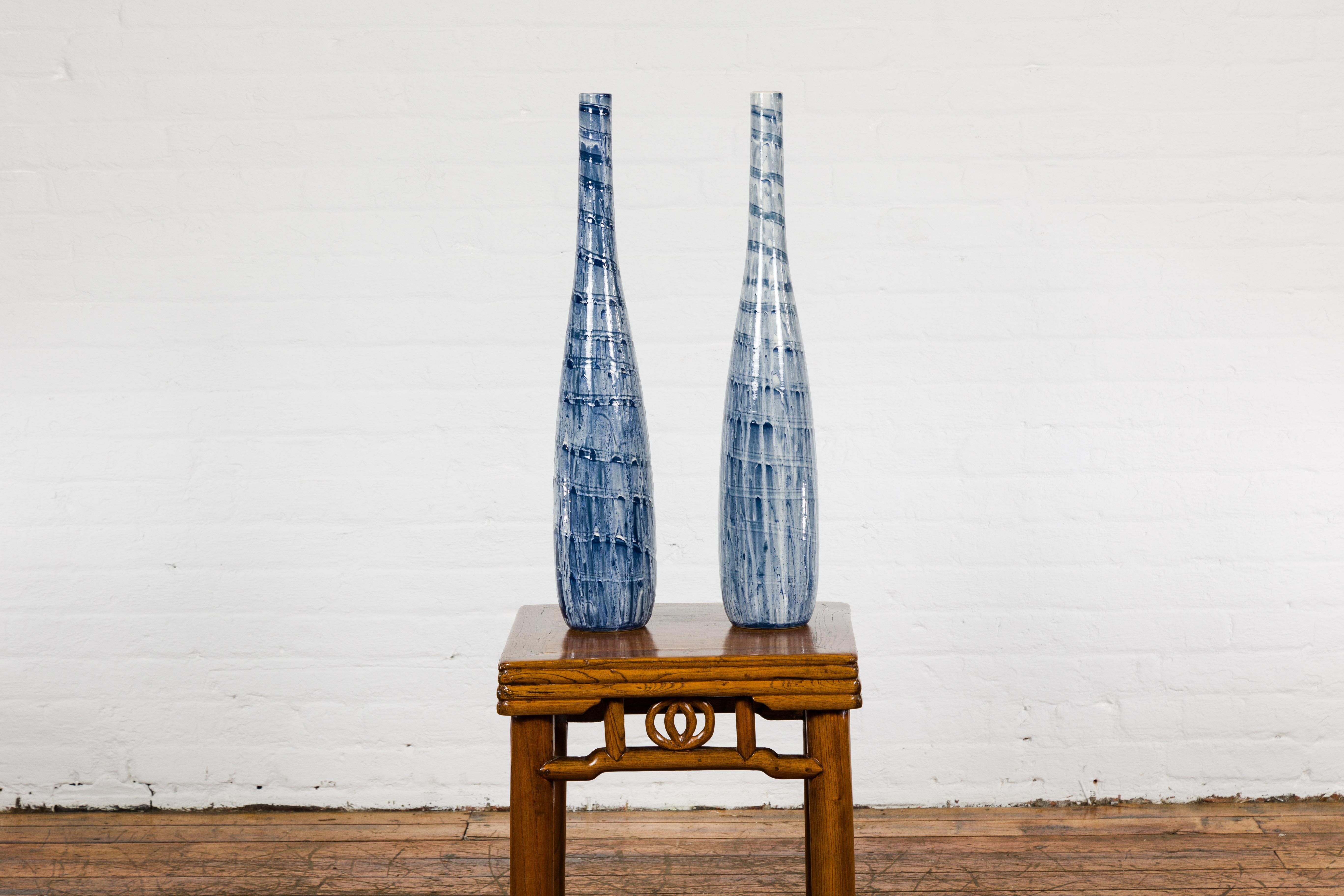 Glazed Slender Blue Vase with Spiraling and Dripping Décor, Two Sold Each  For Sale