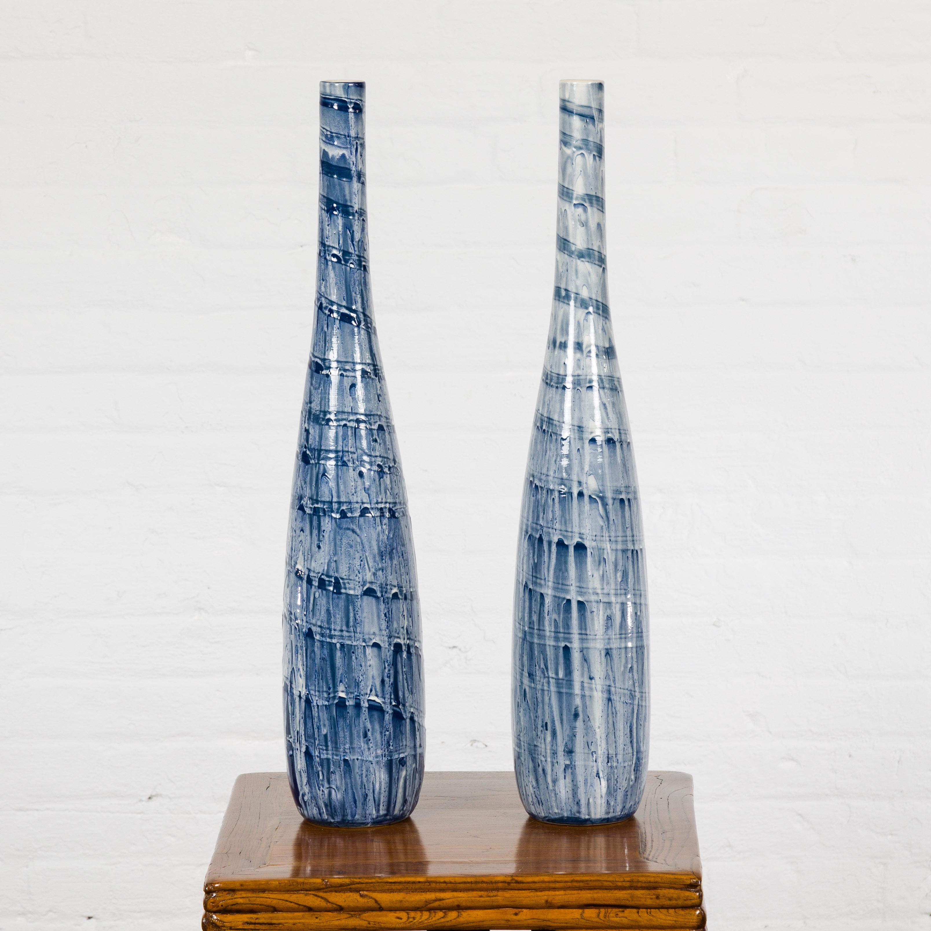 Slender Blue Vase with Spiraling and Dripping Décor, Two Sold Each  In Distressed Condition For Sale In Yonkers, NY