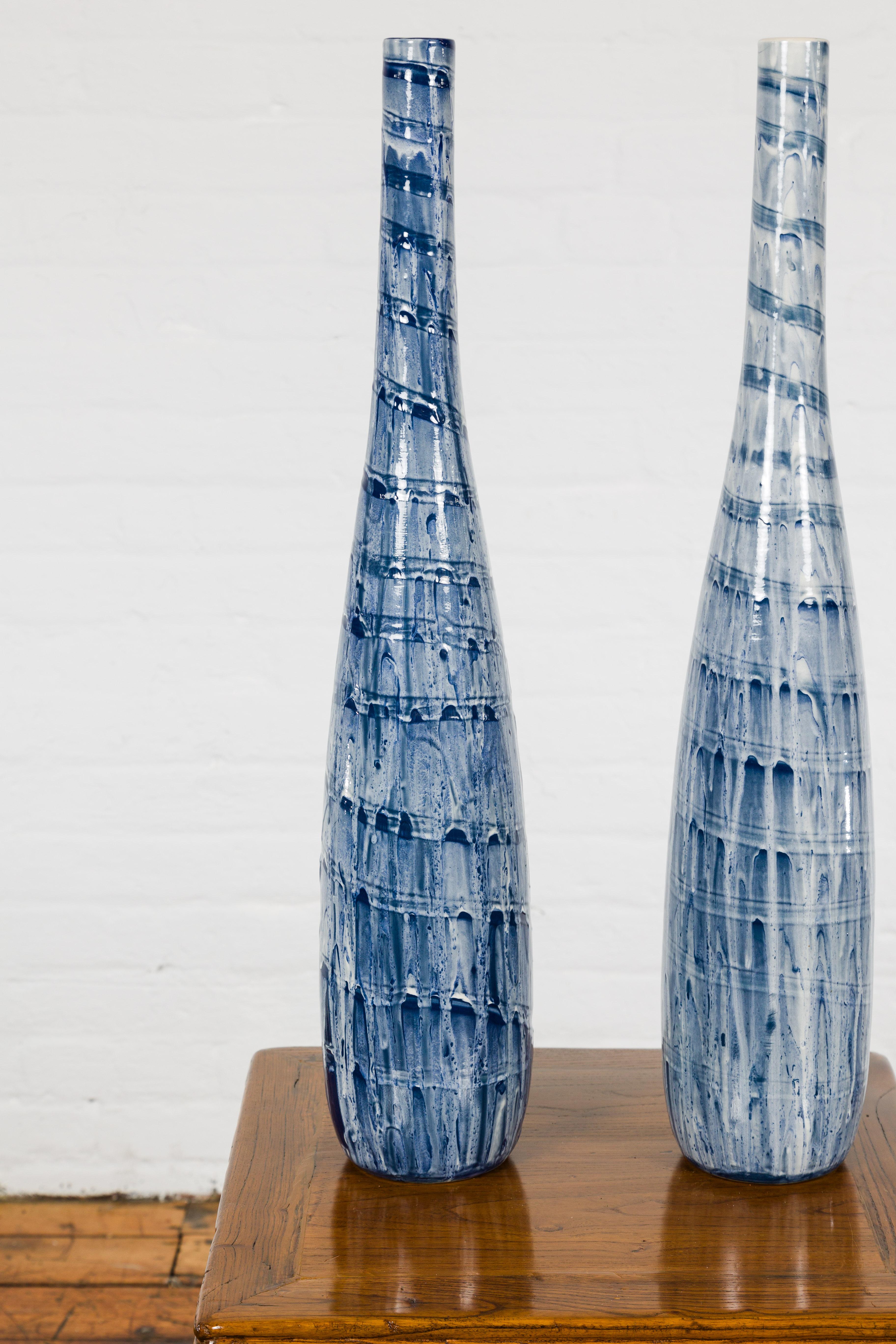 Ceramic Slender Blue Vase with Spiraling and Dripping Décor, Two Sold Each  For Sale