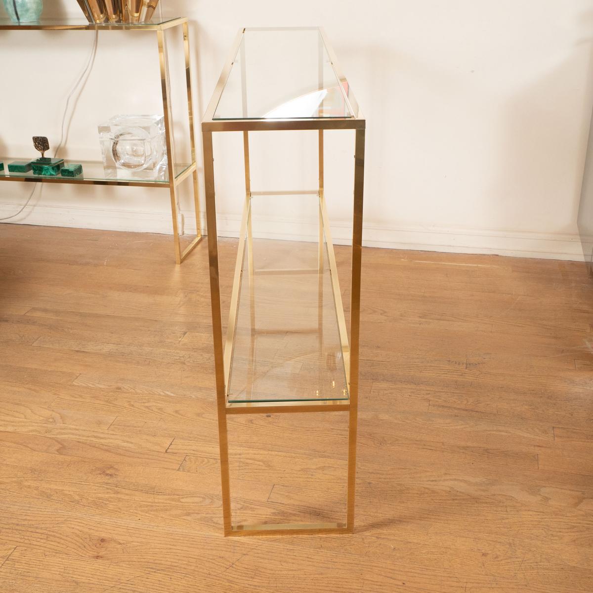 Italian Slender brass and glass two shelf console For Sale