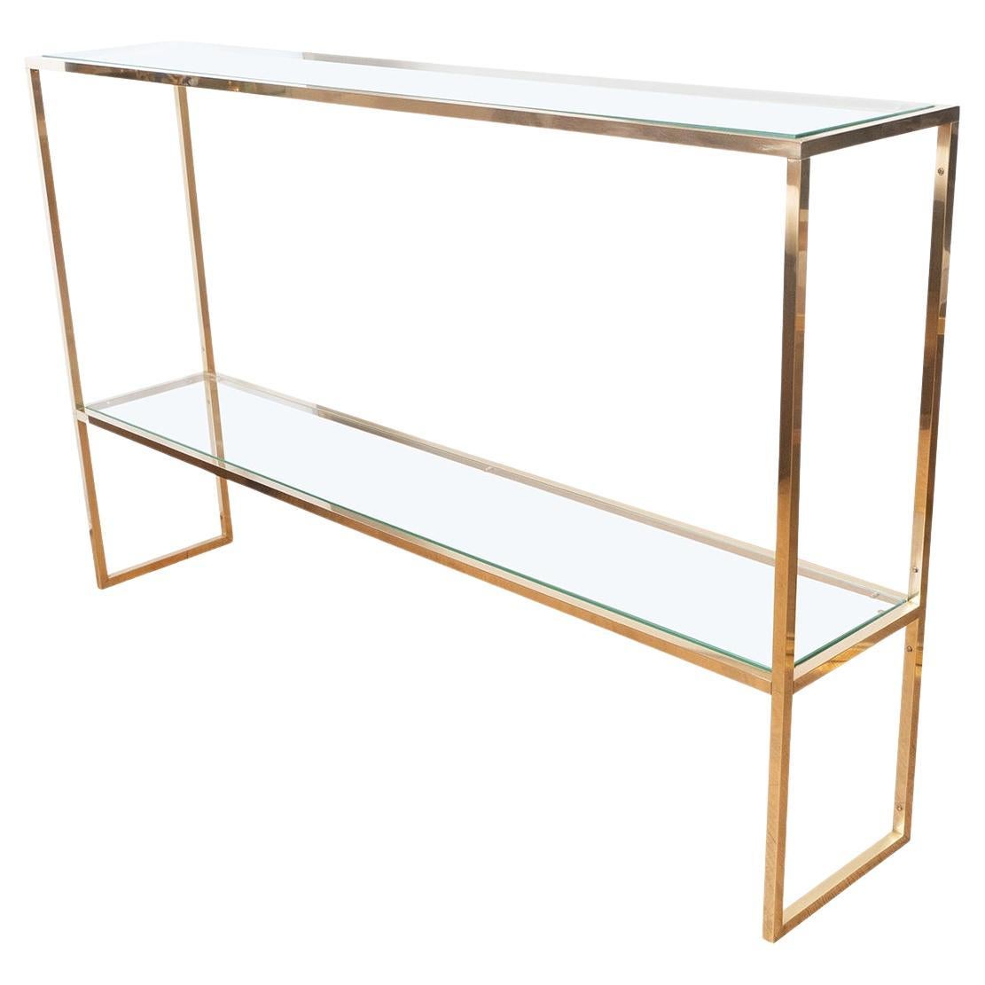 Slender brass and glass two shelf console For Sale