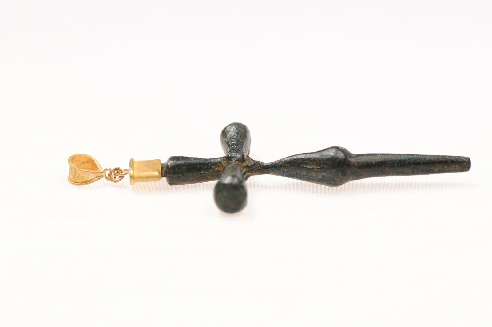 Slender Bronze cross with 21K gold accents (pendant only) In Excellent Condition For Sale In Atlanta, GA