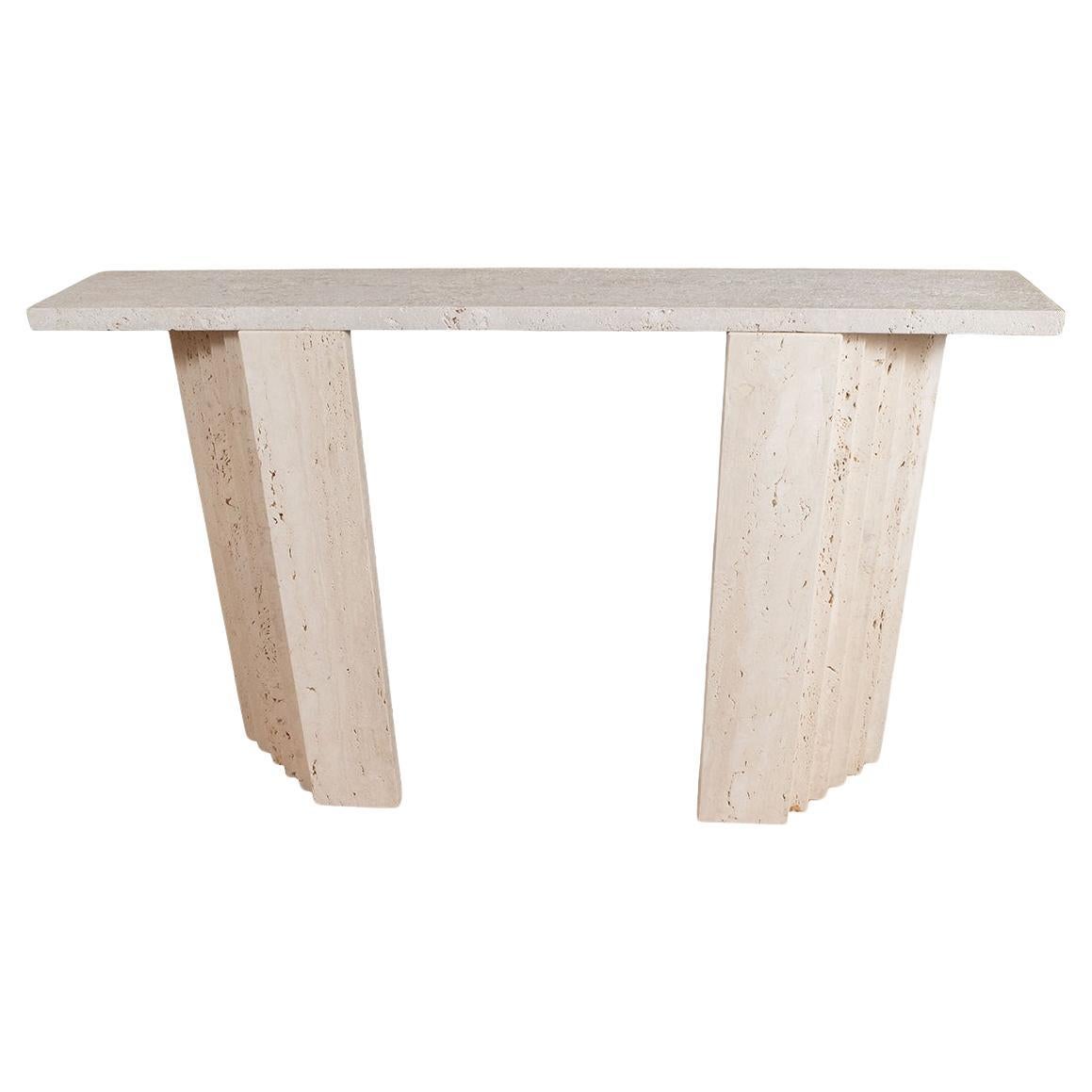 Slender travertine console For Sale