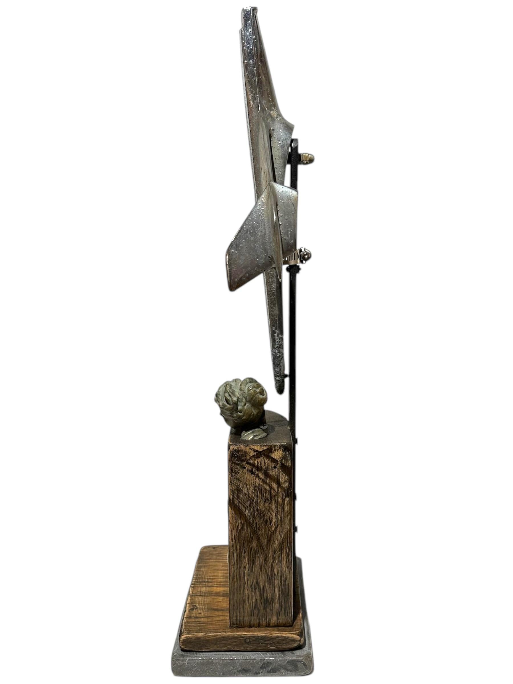 Hand-Crafted Slice #1, Objet d'Art - Sliced Figurine with Hood Ornament on a Marble Base For Sale