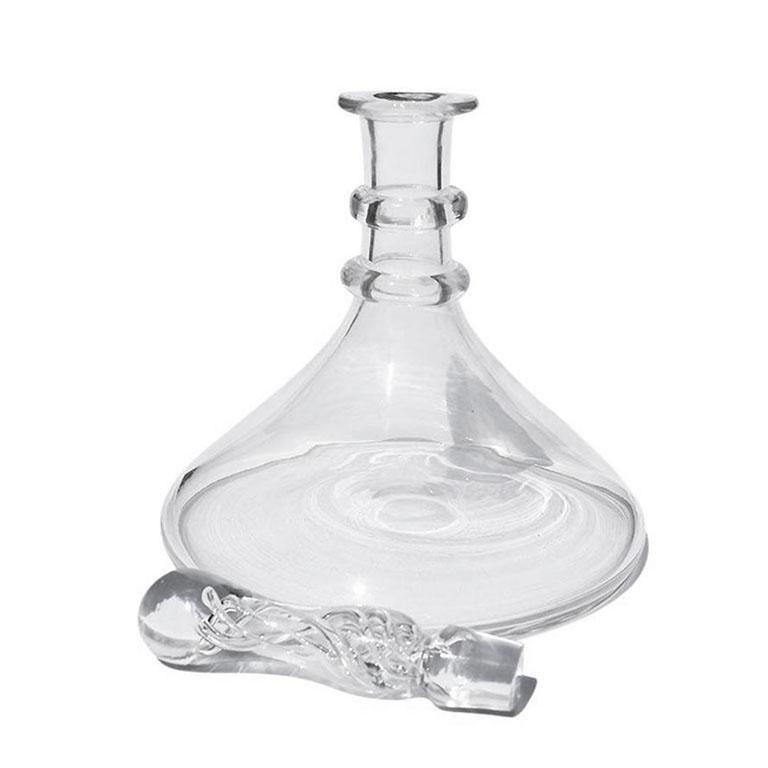A large antique hand-blown clear glass wine or liquor decanter with a beautiful art glass stopper. With a wide base and fluted neck, it will add a traditional and timeless look to any bar. The neck is cut in slice and flute and has a three-ring