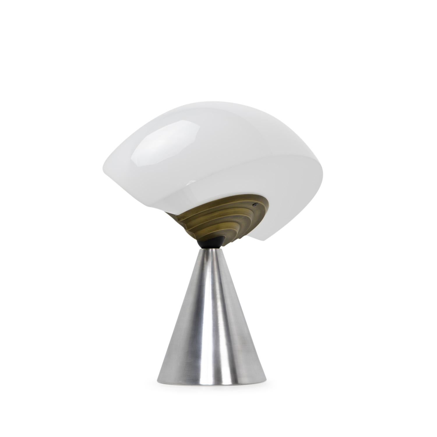 Rare sculptural table lamp by Hans von Klier, designed during the 1980s for Bilumen Italy:

This statement piece consists of a conical shaped metal base, supporting a metal sphere on which the opaque diffusor rests. The diffusor can be tilted and