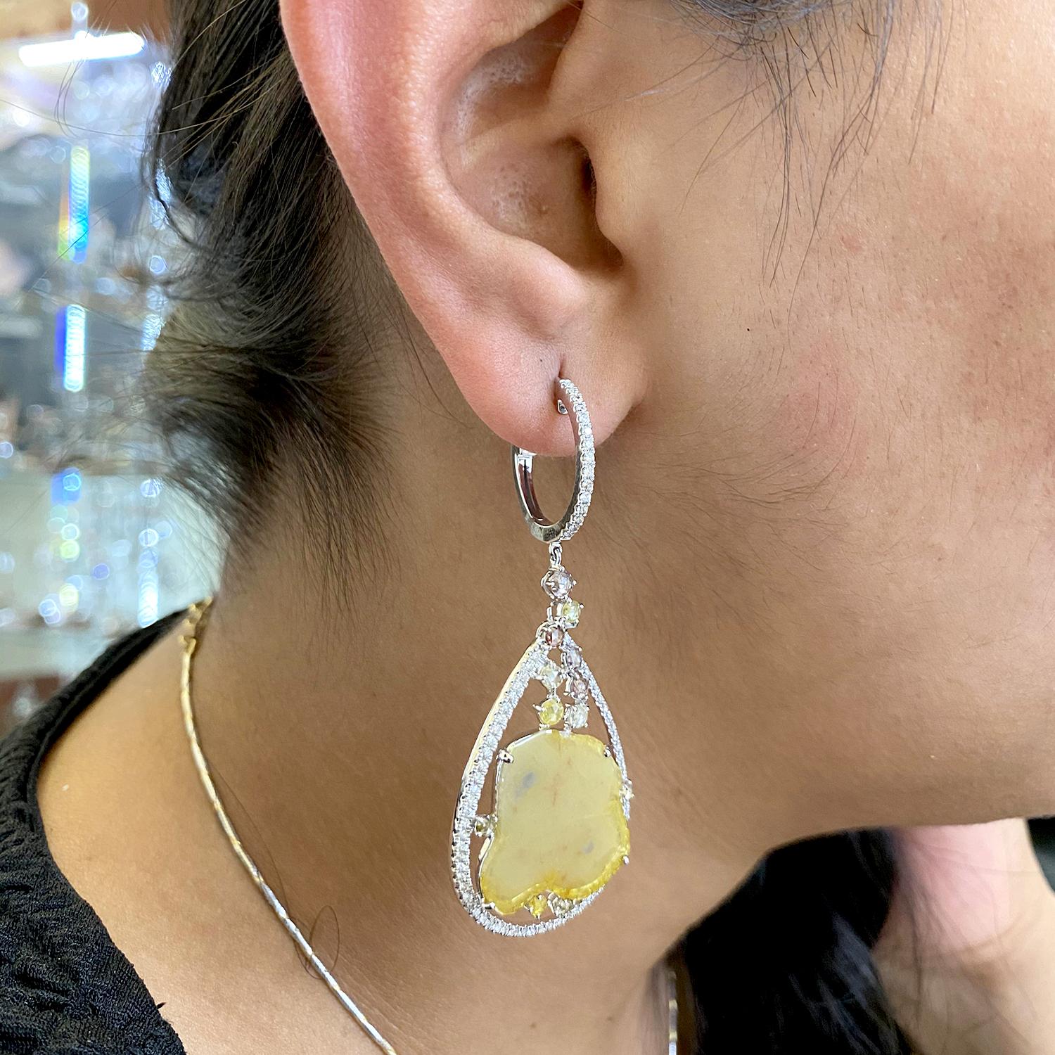 Modern 18k Gold Sliced Yellow Diamond Earring Caged In Pear Shaped Pave Diamond Setting For Sale