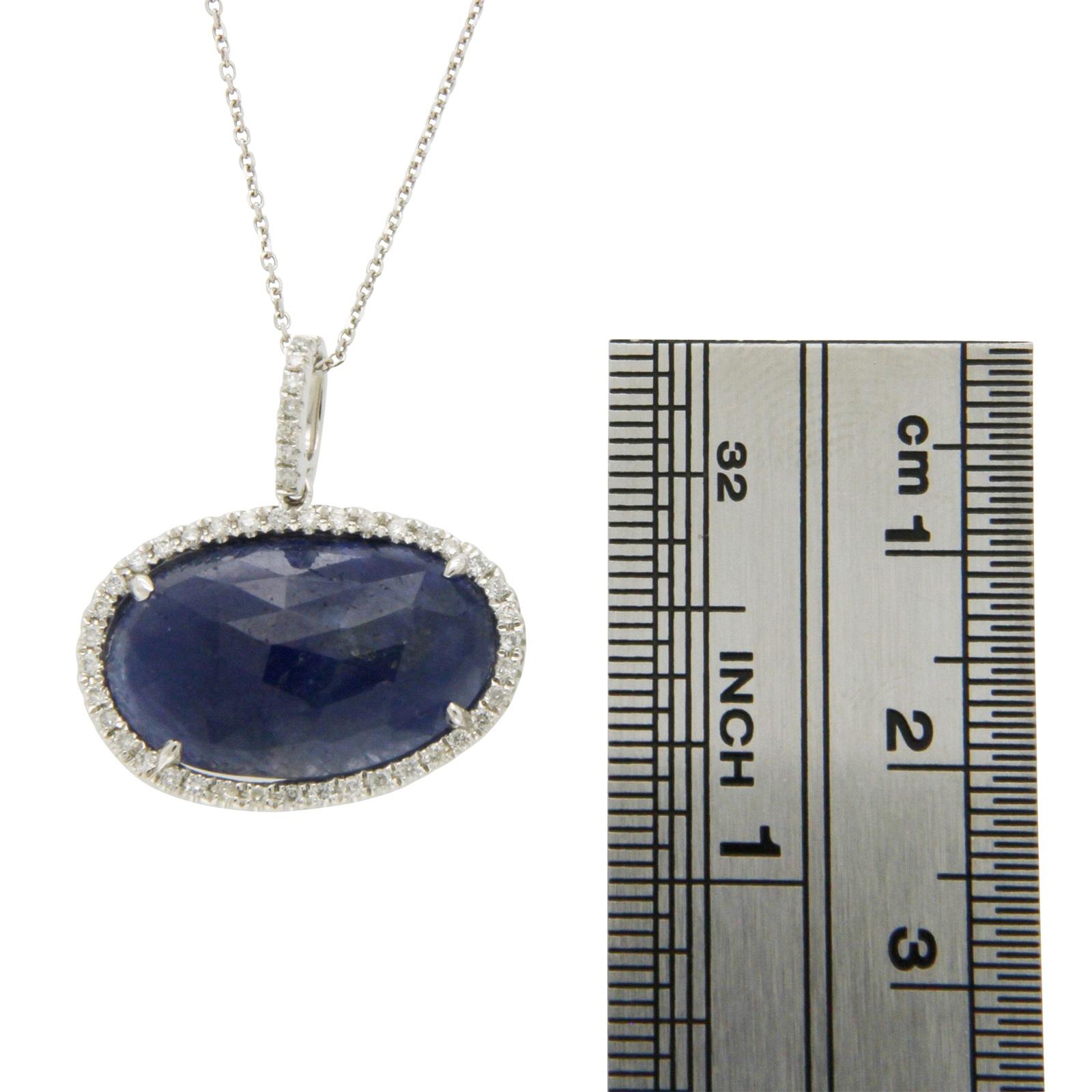 Sliced 8.69 Carat Blue Sapphire 0.24 Carat Diamonds 14 Karat White Gold Necklace For Sale 1