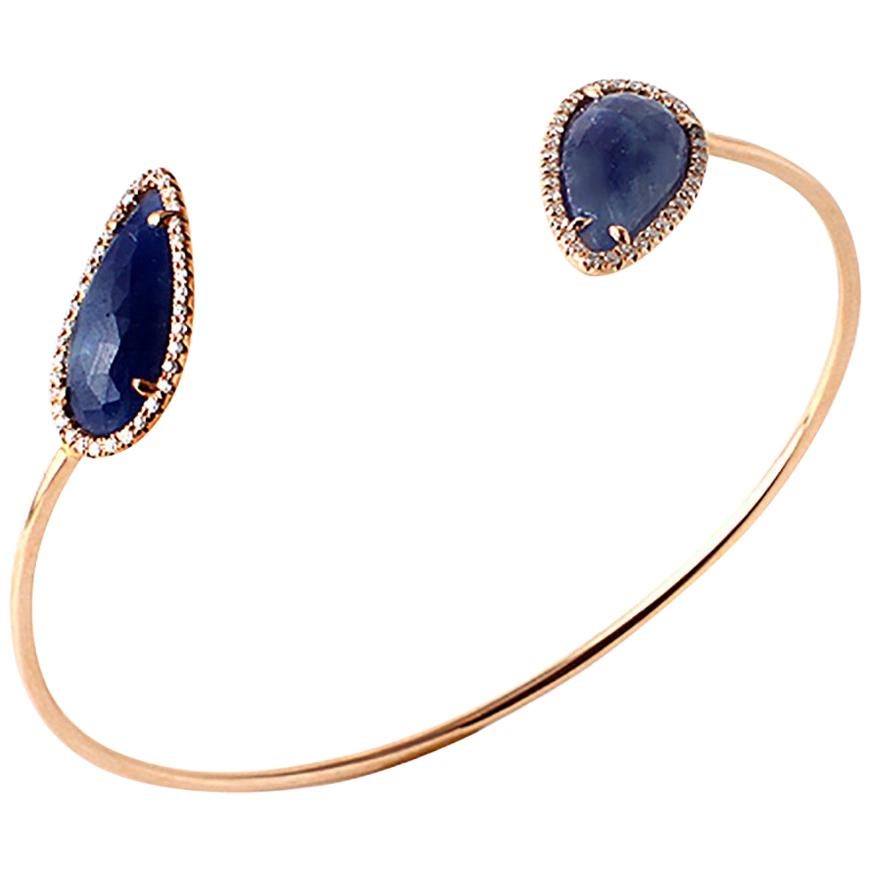Sliced 8.7 Carat Blue Sapphire 0.36 Carat Diamonds 14 Karat Gold Bangle Bracelet For Sale
