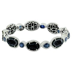 Bracciale con geode tagliato e zaffiro blu con diamanti in oro bianco 18 carati