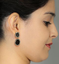 Orecchini a penzoloni a forma di geode affettato con diamanti taglio rosa in oro e argento 18 ct.