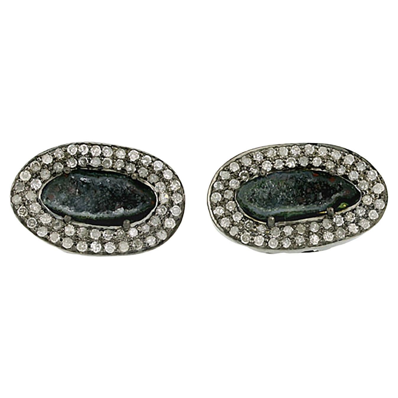 Borchie minimal in oro giallo 18k con diamanti