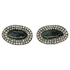 Borchie minimal in oro giallo 18k con diamanti