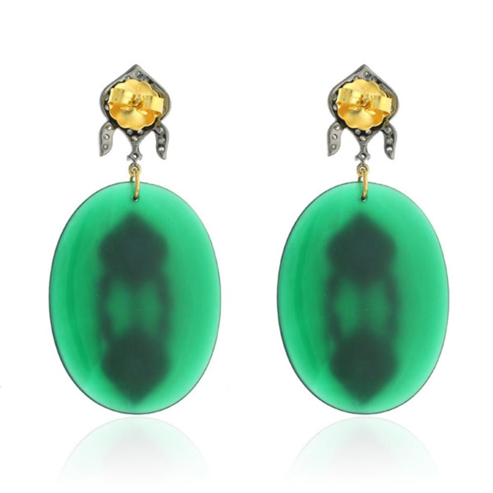 This Sliced Green Onyx Earring with Diamond and Tourmaline Motif on top in silver is an evergreen jewel to add to your collection with gold push and post.

Closure: Push & Post

18K: 1.64gms
Diamond: 2.200cts
SI: 8.68gms
Green Onyx: