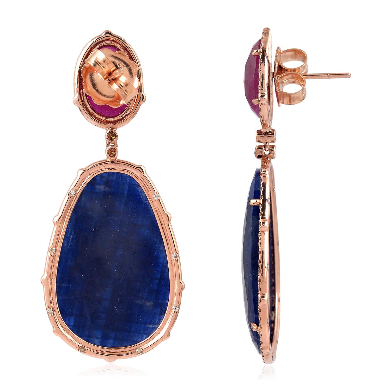Gorgeous looking this two-tone Sliced Ruby and Sapphire Earring set it 18K Gold with diamonds is simply stunning.

Closure: Push Post

18kt Gold: 7.132gms
Diamond: 1.69cts
Ruby: 7.00cts
Sapphire: 47.8cts
