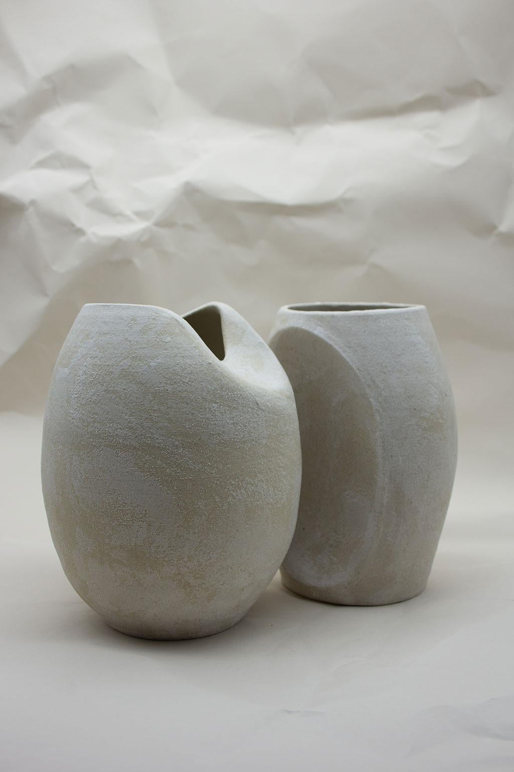 The sliced sphere with half sliced form blurs the boundary between functional vases and a sculptural objects. Created as part of the Soft, Soft Hard 2018 Collection, these pieces are an exploration into form and the relationship between the wheel