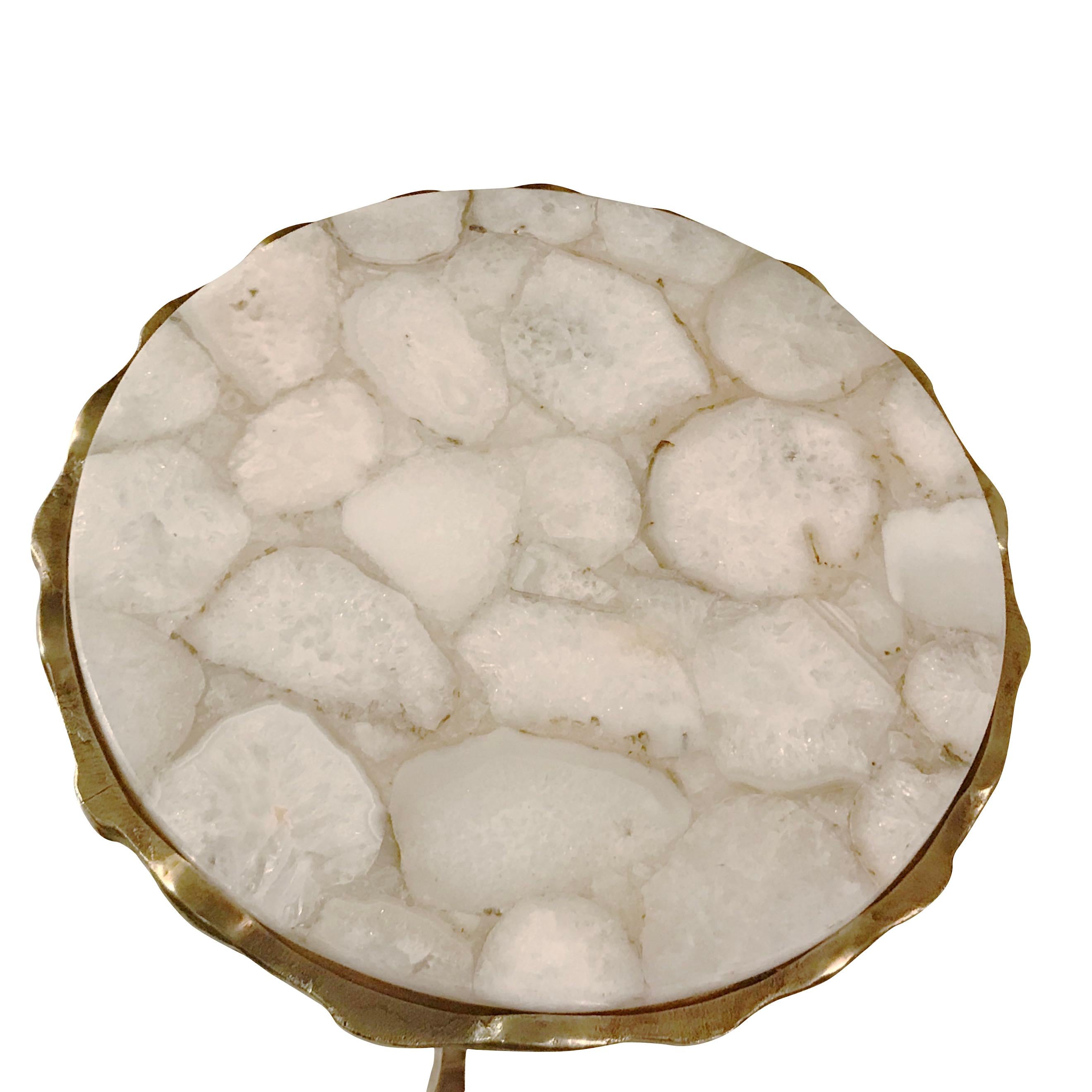 Contemporary Belgian round cocktail table with top of polished pieced or sliced white agate.
Tripod hammered bronze legs.