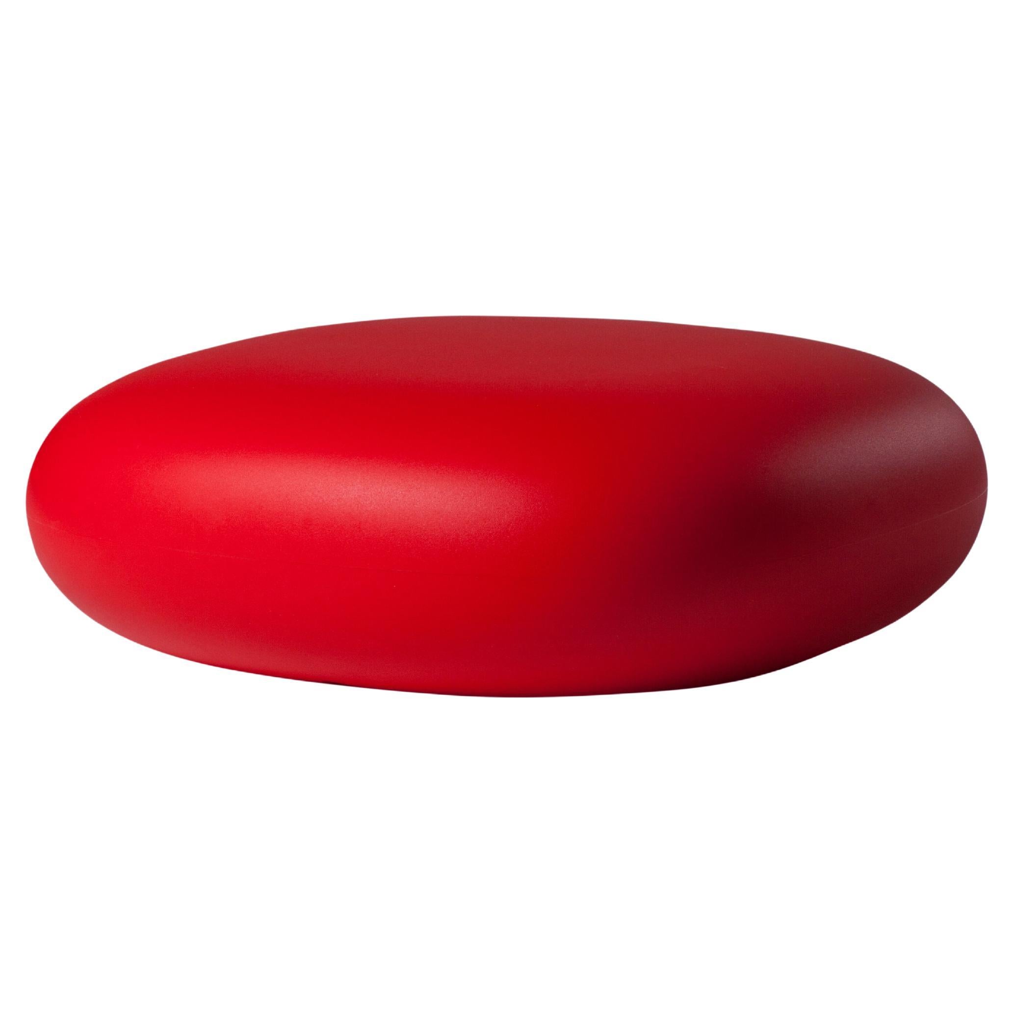 Pouf bas en forme de glissière rouge flamme de Marcel Wanders