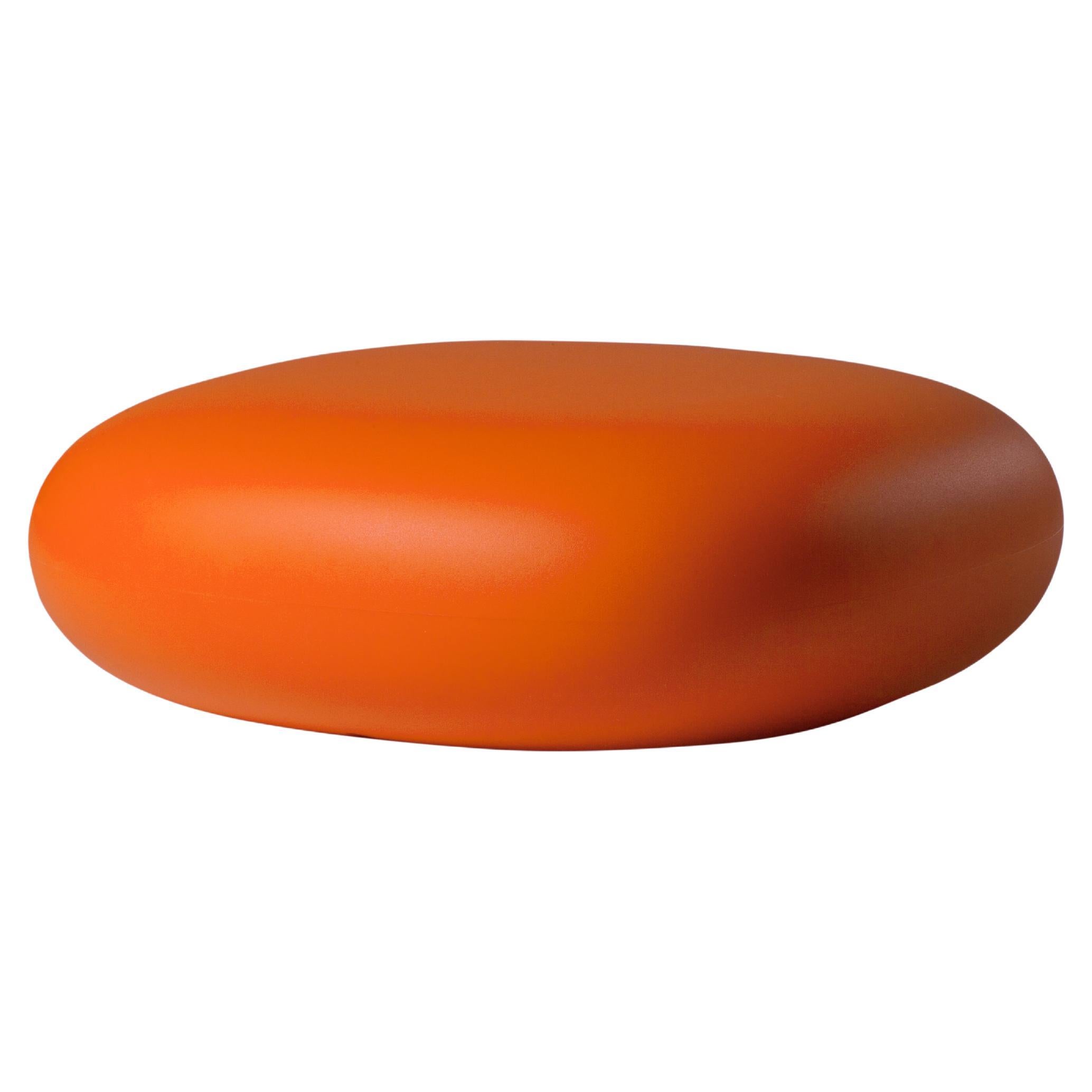 Pouf bas Slide Design en peau de mouton orange de Marcel Wanders
