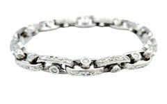 Bracciale a maglie ovali con diamanti scorrevoli e design a spirale in oro bianco 14 carati