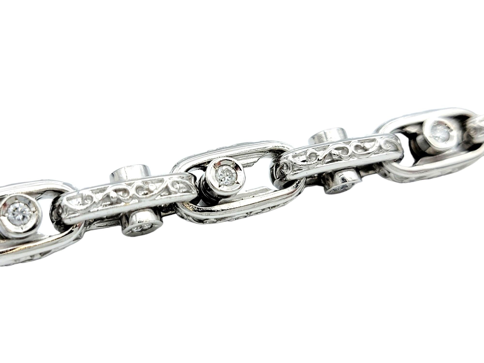 Contemporary Sliding Diamond Oval Link Bracelet with Scroll Design Set in 14 Karat White Gold For Sale