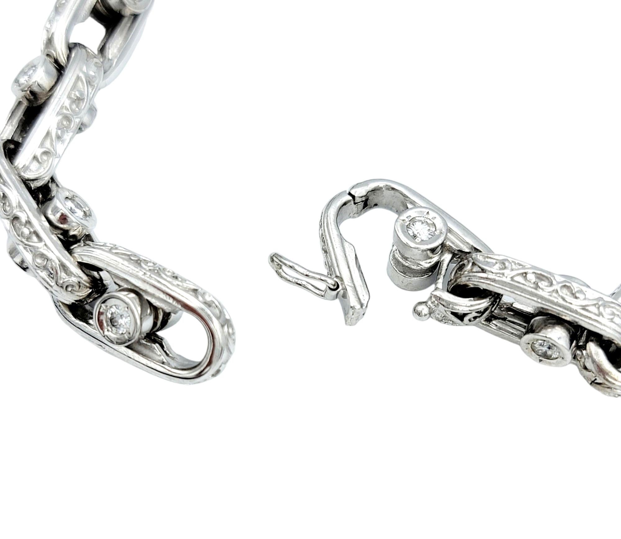 Sliding Diamond Oval Link Bracelet with Scroll Design Set in 14 Karat White Gold For Sale 1