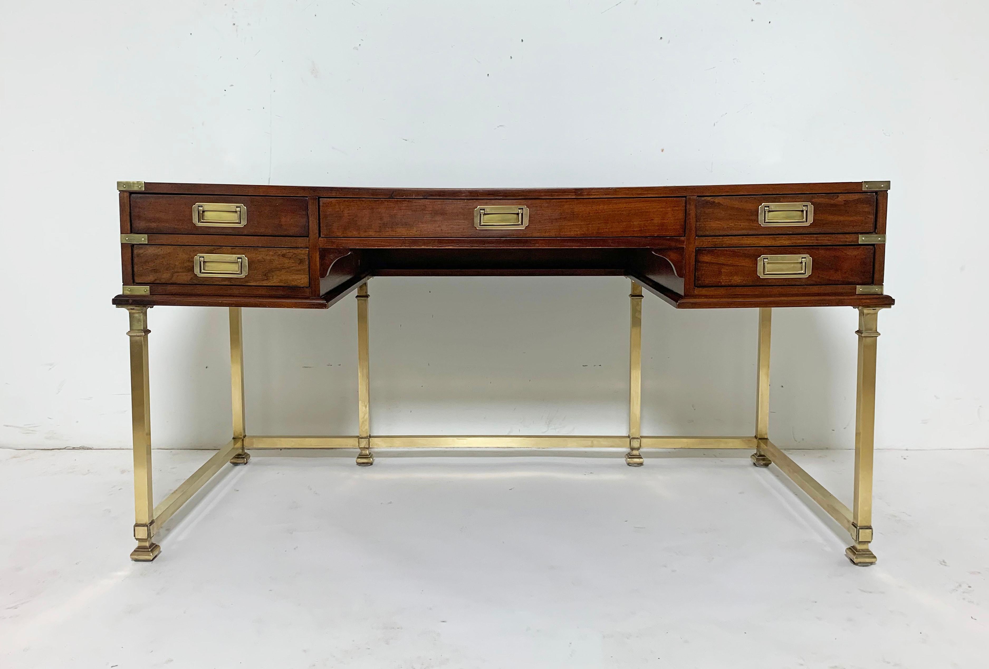 A brass and mahogany campaign desk with leather top by Sligh Furniture, circa 1960s.