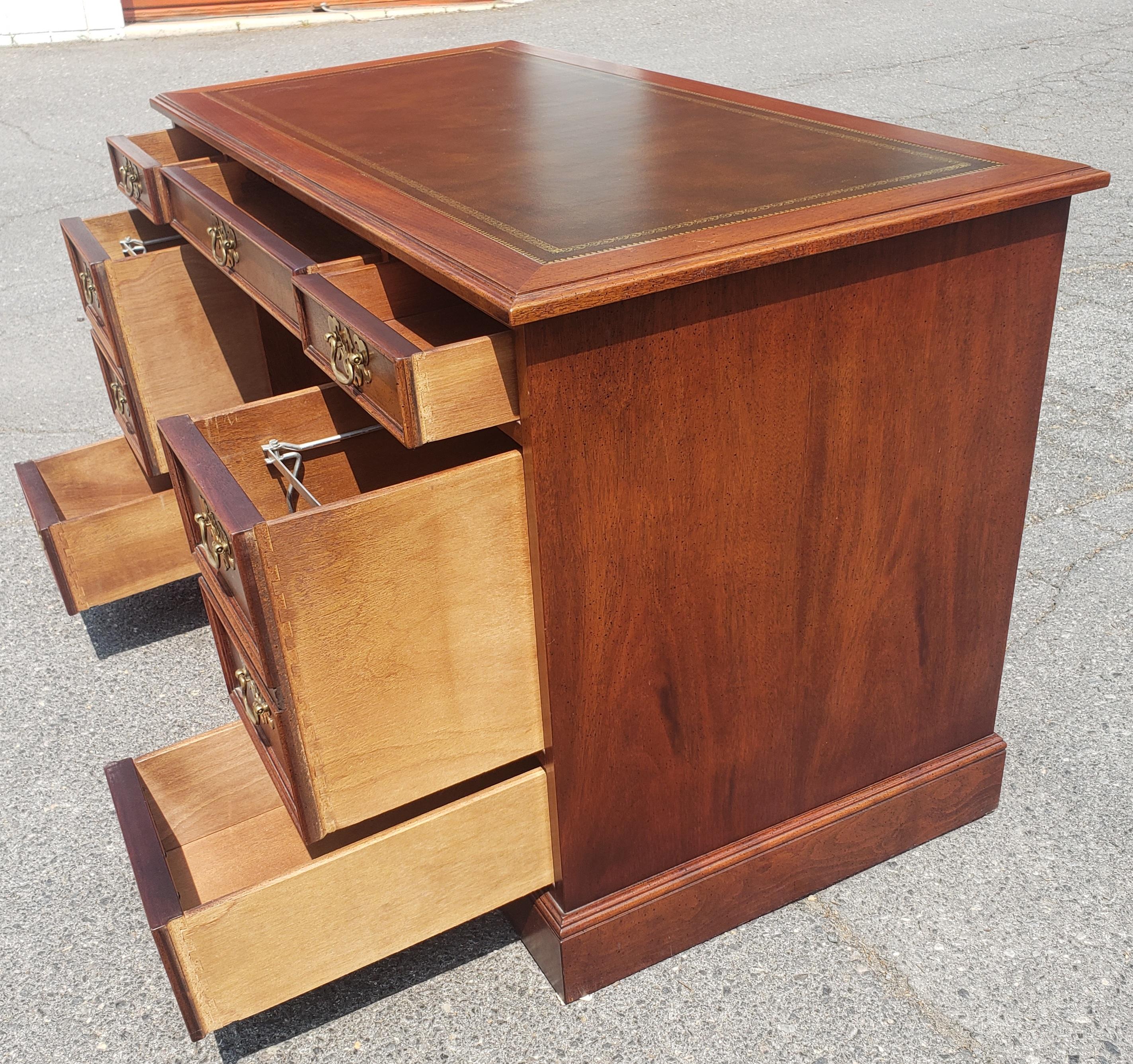 20th Century Sligh Furniture Chippendale Mahogany and Tooled Leather Partners Desk with Glass