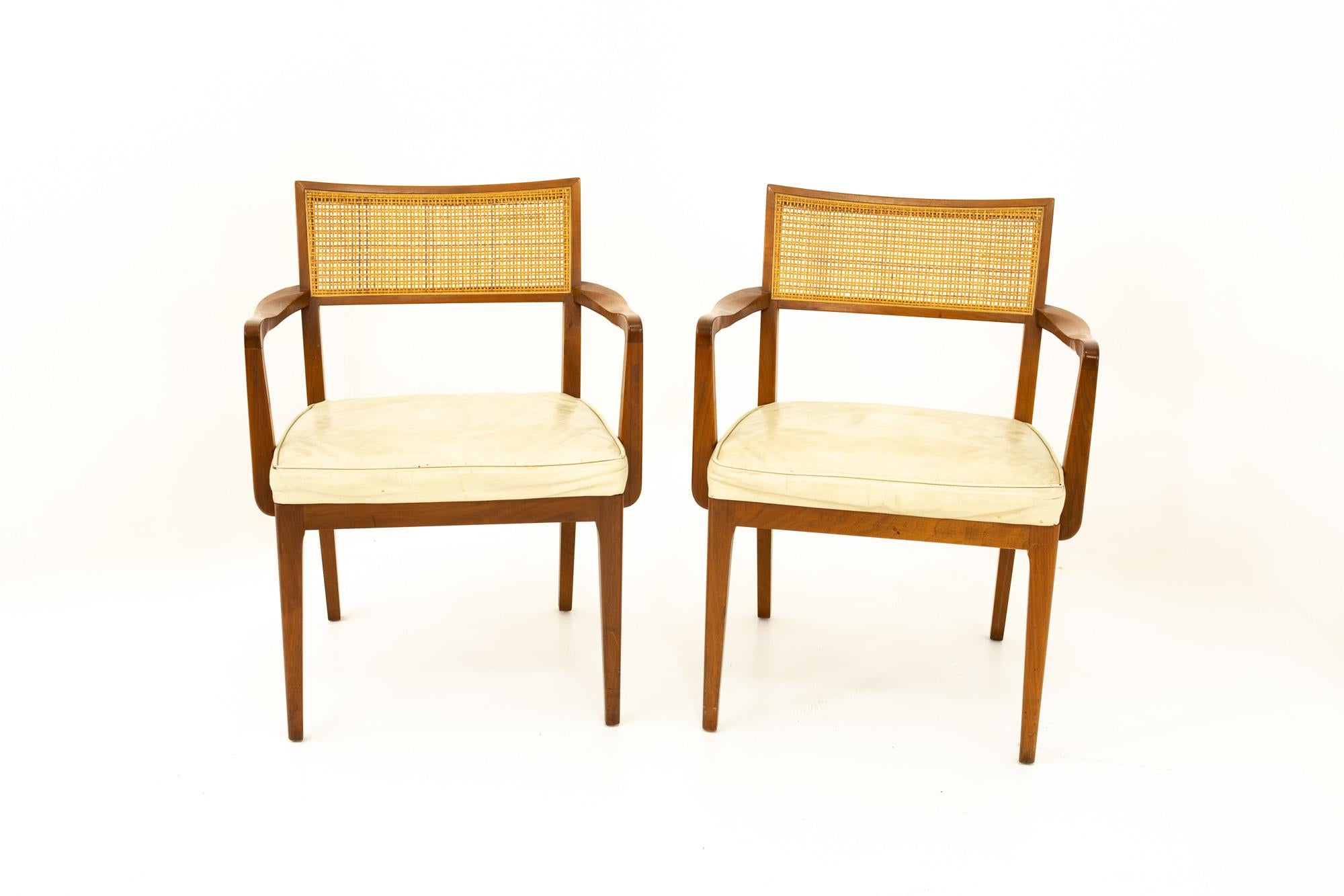 Sligh Furniture midcentury dining chairs, pair
Each chair measures: 25 wide x 22.5 deep x 32.25 high with a seat height of 19 inches

This set is available in what we call restored vintage condition. Upon purchase, it is thoroughly cleaned and